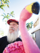 Gerry Jamison stands with sculpture 'The Real Florida Lottery,' made by his artist friend Randi Grantham.