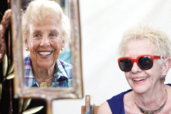 Jewelry designer Shirley McCaffrey and her customer Liz Galbreath (in mirror)
