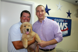 Kevin Johnson, Kyle Reed with KJ the puppy