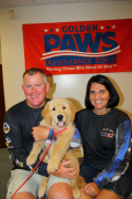 Dan Rogers, Tracy Rogers with KJ the puppy