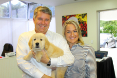 Michael Wynn, Paula Wynn with Golden PAWS puppy