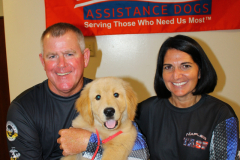 Dan Rogers, Tracy Rogers with KJ the puppy